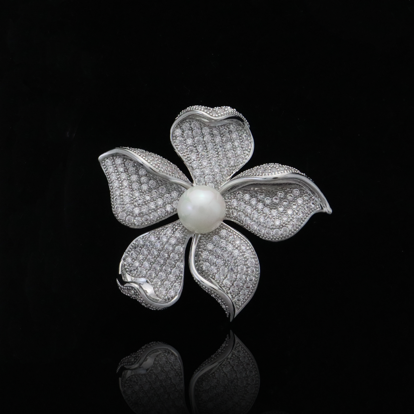 Elegant flower pin with sparkling CZ diamonds and a central pearl for sophisticated flair