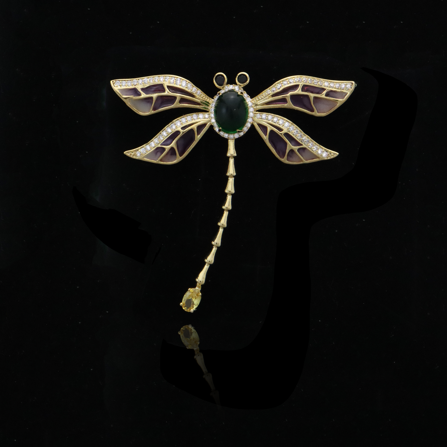 Art Nouveau style dragonfly brooch with green and purple enamel and diamond accents