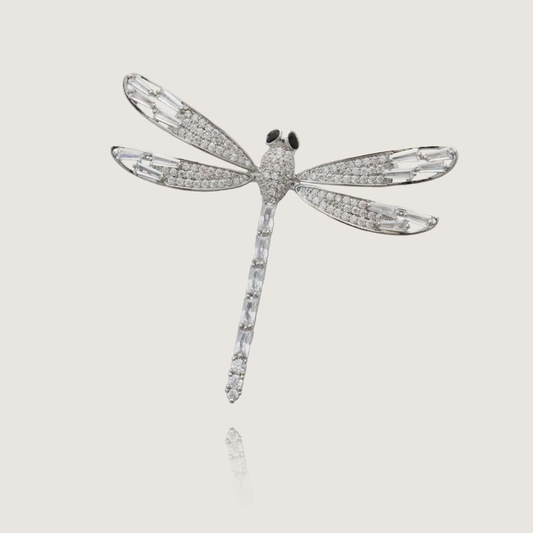 Chic Dragonfly Pin Adorned with Pave Diamonds on Silver, Perfect for High Fashion.