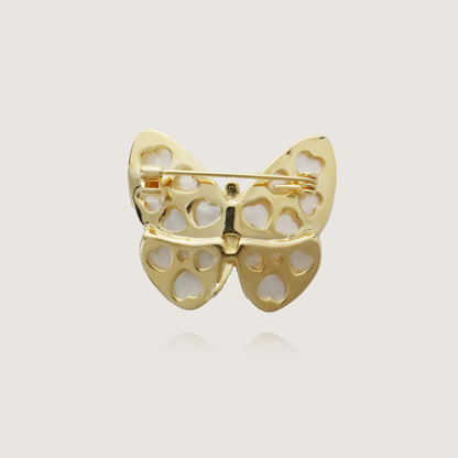 Elegant butterfly pin with translucent wings and a delicate diamond body