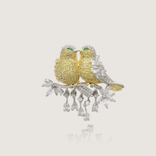 Elegant Dual Owl Pin with Diamond Accents and Green Eyes