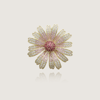 Golden daisy pin with sparkling pink and clear diamonds