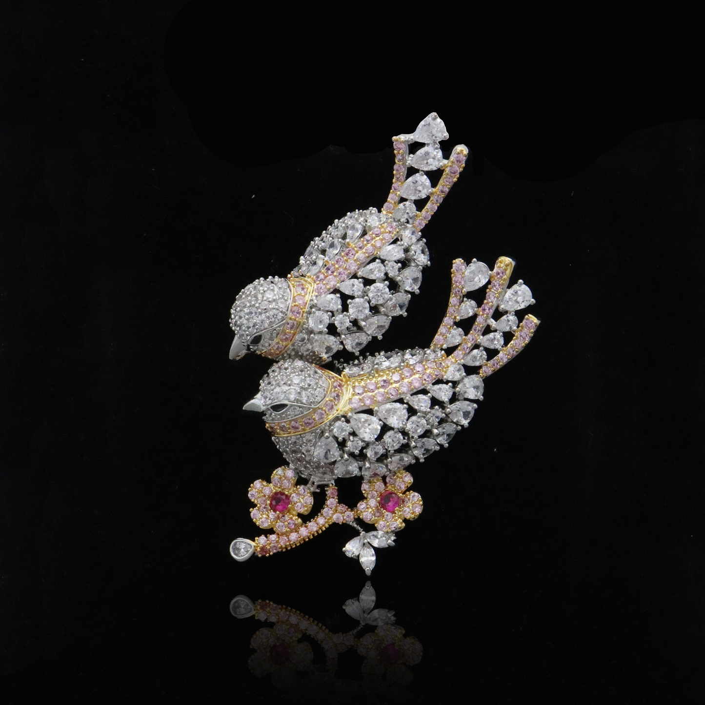 Elegant avian duo brooch sparkling with crystals and delicate colored detailing