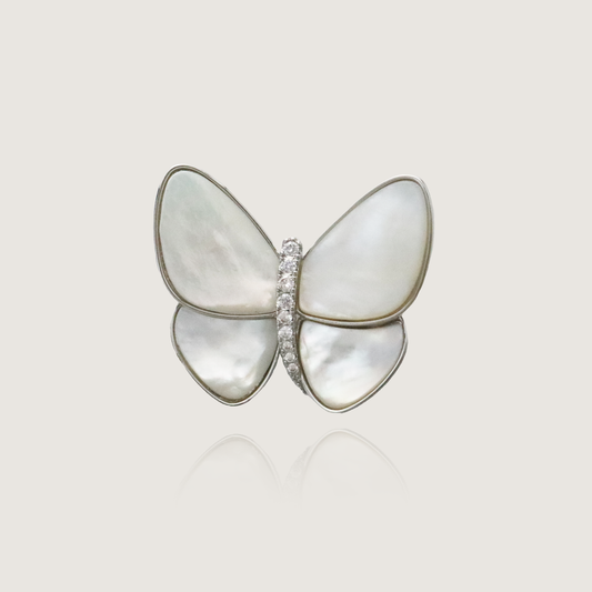 Timeless mother-of-pearl butterfly brooch with a diamond-studded body